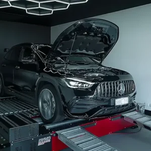 a black car with its hood up